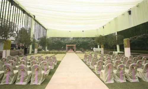 Day wedding mandap decor with seating arrangement at Grand Mantram Resort, Gurgaon
