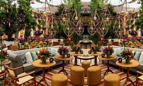 Luxury Haldi ceremony lounge décor at Grand Mantram Resort in Gurgaon with vibrant and festive seating arrangements