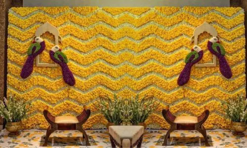 Luxury Haldi ceremony stage backdrop décor at Grand Mantram Resort in Gurgaon with vibrant colors and festive design