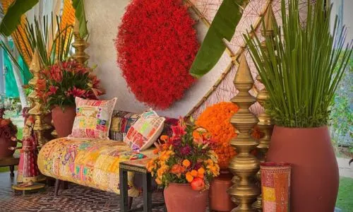 Luxury Mehendi stage with rustic décor elements at Grand Mantram Resort in Gurgaon for pre-wedding celebrations