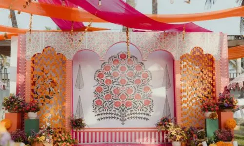 Luxury Mehendi ceremony floral décor at Grand Mantram Resort in Gurgaon with vibrant flowers and elegant seating arrangements