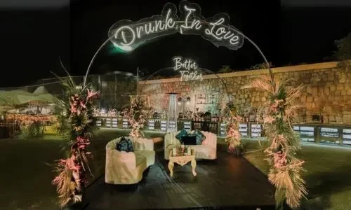 Elegant bar seating arrangement with décor for Sangeet and Cocktail Night at Grand Mantram Resort in Gurgaon